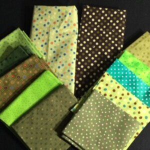 Assorted "dotty" green fabric